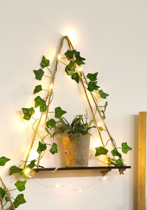 etagere-murale-bois-feuilles-suspendus-vase