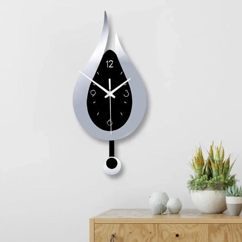 horloge-murale-originale-goutte-eau-plante